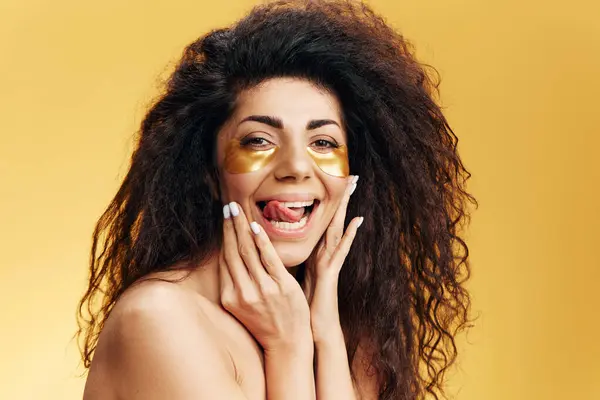 Enjoyed Happy Pretty Latin Female Gold Hydrogel Patches Eye Stick — Stock Photo, Image