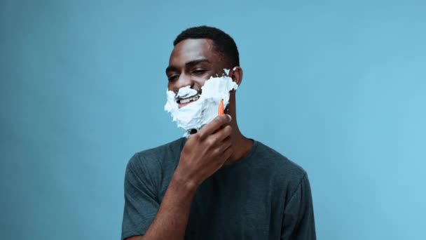 African American Man Shaves His Beard Razor Shaving Foam Applied — Stock Video