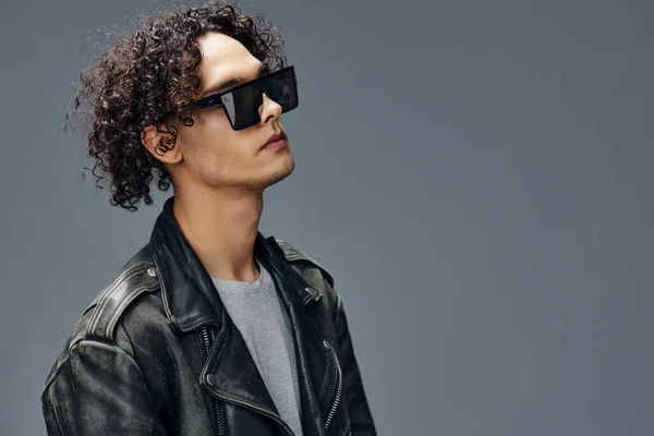 Stylish Tanned Curly Man Leather Jacket Mirror Trendy Eyewear Looks — Stock Photo, Image