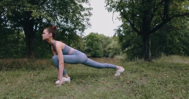 Young Woman Doing Fitness Stretching Gymnastics Outdoors Park Outdoors Standing — Stock Video