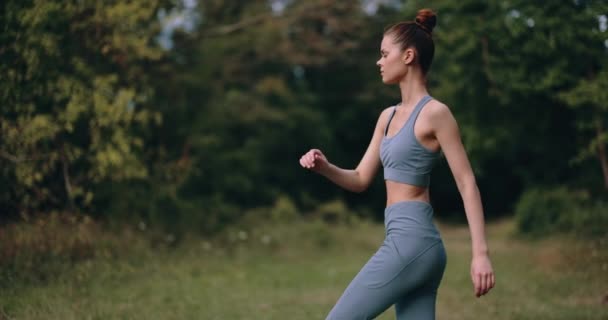 Woman Warms Her Body Workout Nature Concept Athletic Body Health — Stock Video