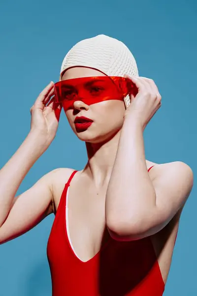 Angry Lady Red Swimsuit Swimming Cap Puts Glasses Posing Blue — Stock Photo, Image