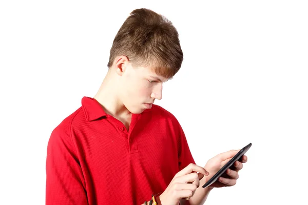 Dospívající chlapec z digitálního počítače tablet PC — Stock fotografie