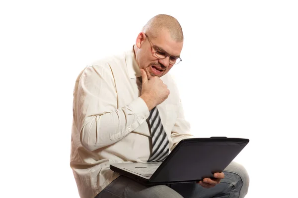 Worried man looking at computer — Stock Photo, Image