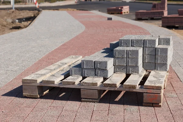 Sidewalk construction bricks — Stock Photo, Image