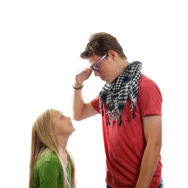 Teen boy and a young girl — Stock Photo, Image