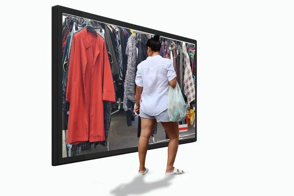 Woman watches television models of clothes