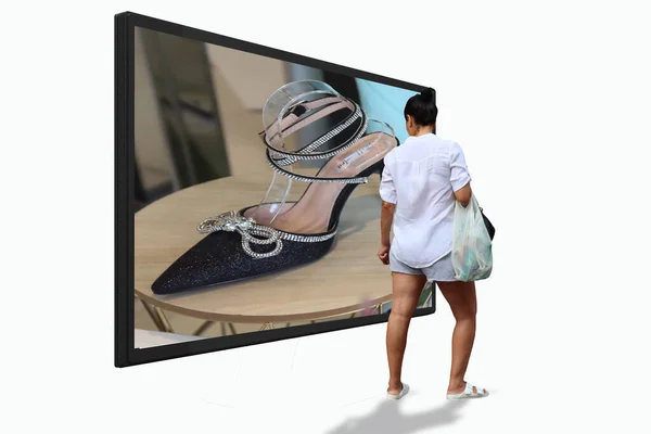 Woman Watches On Television Models Of Shoes