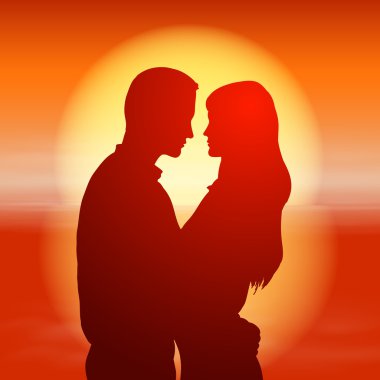 coucher du soleil de mer avec couple de silhouette.