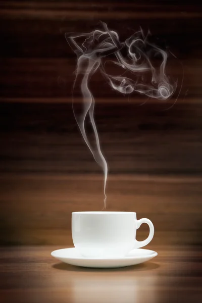 Tazza di caffè con fumo a forma di donna — Foto Stock