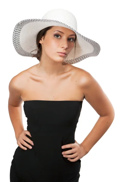 Beautiful woman in a hat looking at camera — Stock Photo, Image