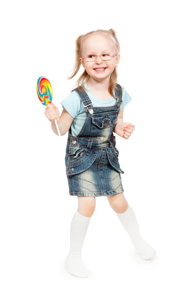 漂亮的小女孩抱着一个大的棒棒糖 — 图库照片
