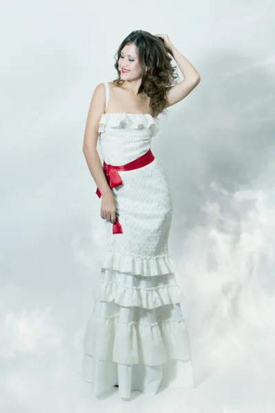 Beautiful woman in wedding dress — Stock Photo, Image