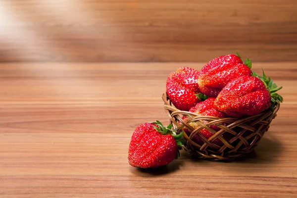 Fresh strawberries in a small pottle — Stock Photo, Image