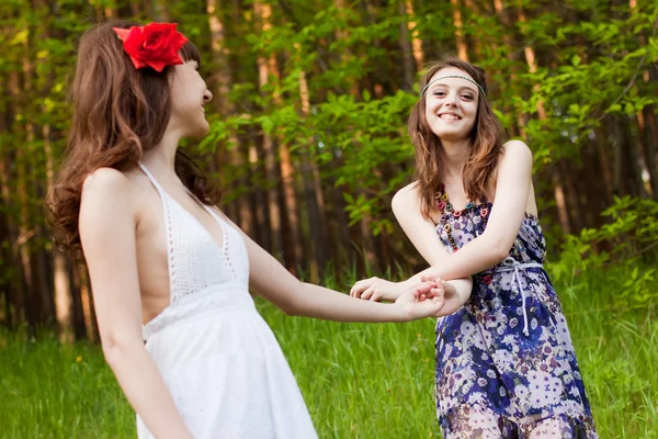 Young girls in the forest — Stock Photo, Image