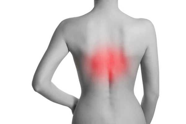 Kobieta cierpi na bóle kręgosłupa — Zdjęcie stockowe