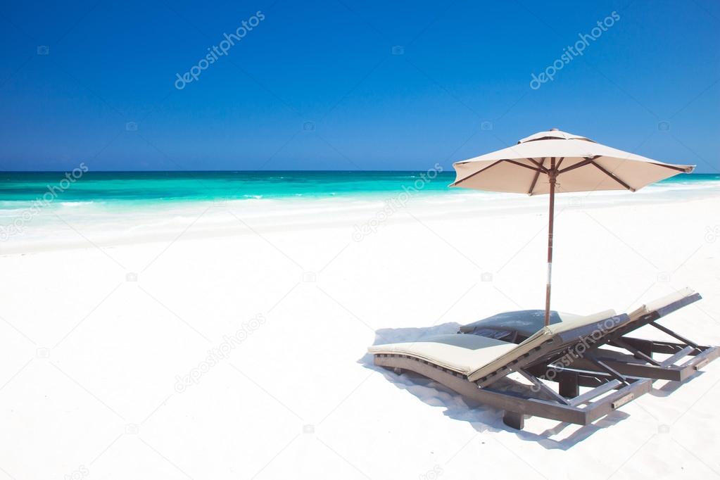 Umbrella on a perfect white sand Tulum beach in Mexico