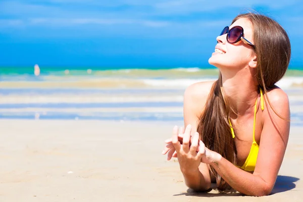 Long haired woman in bikini on tropical beach Royalty Free Stock Photos