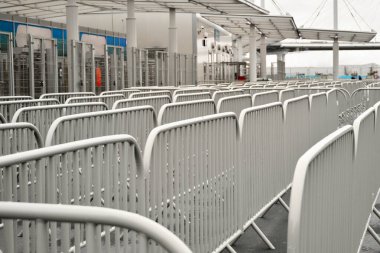 Modern turnstile at the stadium. Card access system, video surveillance, scanner, barrier.