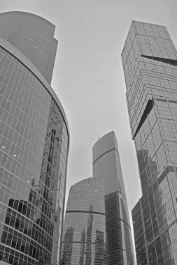 three skyscrapers against the sky moscow russia black and white photo