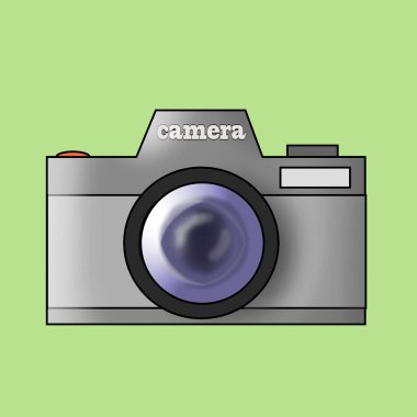 Retro analog film camera With lens on green background