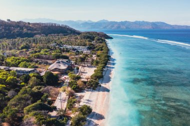 Tropical sea with turquoise water and green trees. Gili Trawangan, Indonesia. High quality photo