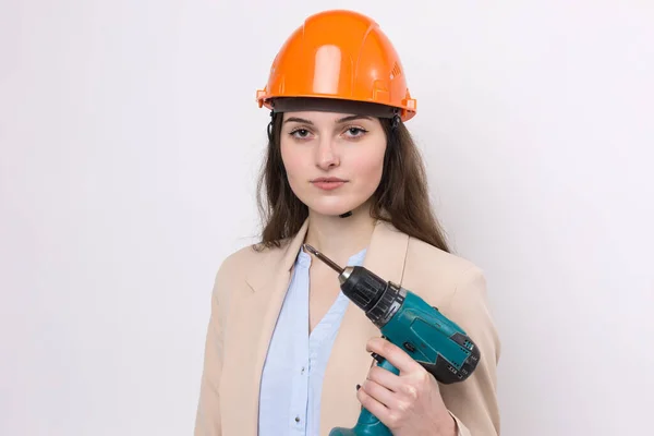 Menina Engenheiro Capacete Construção Laranja Com Uma Chave Fenda Martelo — Fotografia de Stock