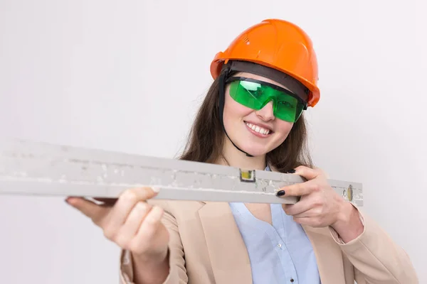 Girl Engineer Orange Construction Helmet Building Level Her Hands White — Stock Photo, Image