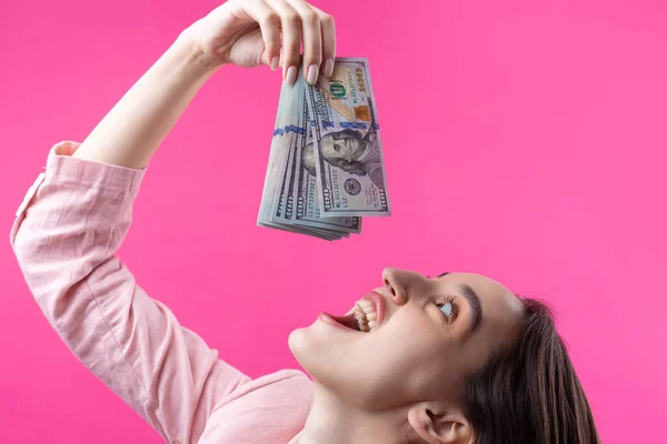 Woman Pink Jacket Swallows Pack Dollars Greed Venality Corruption Concept — Stock Photo, Image