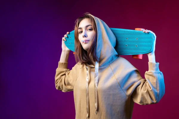 Young Beautiful Fashionable Hipster Girl Dressed Hoodie Holds Skateboard Her — Stock Photo, Image