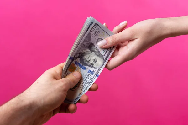 Woman Pink Jacket Receives Bribe Dollars Red Background — Stock Photo, Image