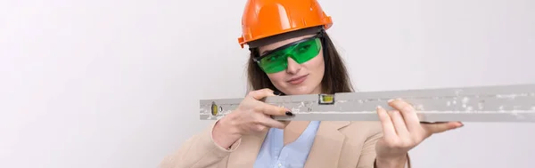 Girl Engineer Orange Construction Helmet Building Level Her Hands White — Stock Photo, Image