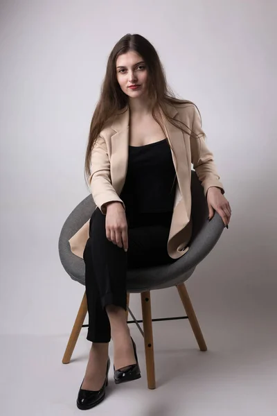 Portrait Young Brunette Long Hair Studio Cute Girl Sitting Chair — Stock Photo, Image