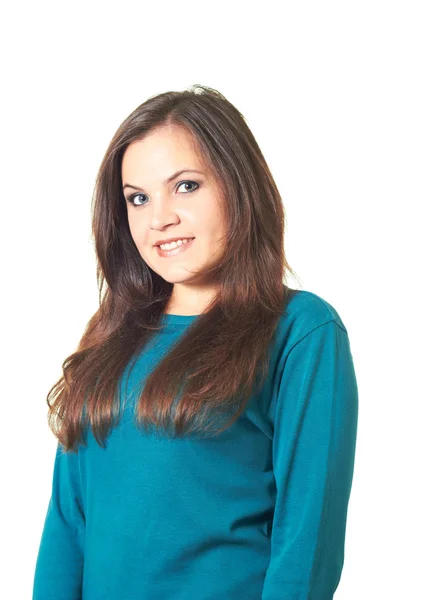 Attractive smiling girl with long dark hair in a blue blouse. — Stock Photo, Image