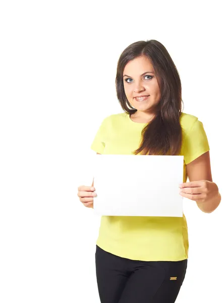 Attraktives lächelndes Mädchen im gelben Hemd mit einem Poster. — Stockfoto