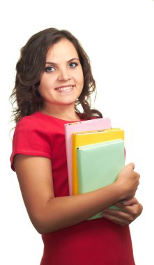 kırmızı gömlekli bir renkli kitap tutan çekici gülümseyen kız.