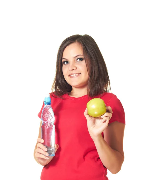 Aantrekkelijke lachende meisje in een rode shirt in haar linkerhand houdt een — Stockfoto