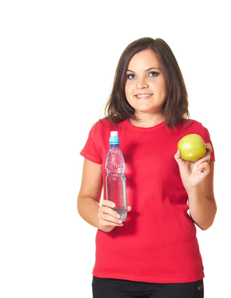 Aantrekkelijke lachende meisje in een rode shirt in haar linkerhand houdt een — Stockfoto