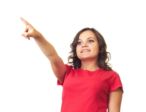 Attractive girl in red shirt shows her right hand to the right. — Stock Photo, Image