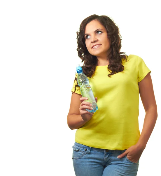 Attractive smiling girl in a yellow shirt holding in her right h — Stock Photo, Image