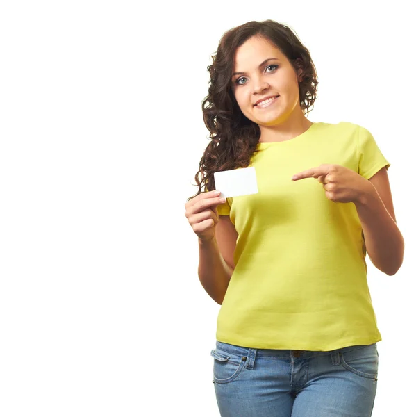 Attractive smiling girl in a yellow shirt holding in her right h — Stock Photo, Image