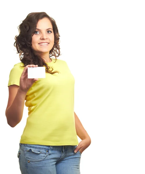 Attractive smiling girl in a yellow shirt holding in her right h — Stock Photo, Image