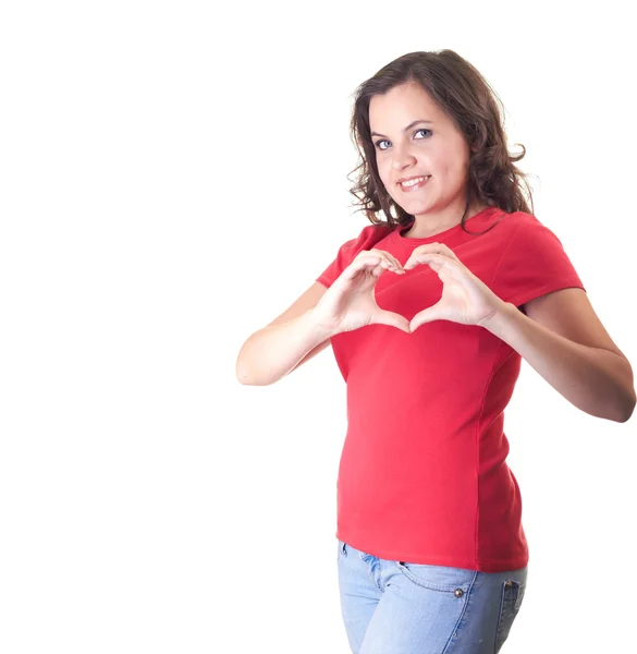 Muchacha sonriente atractiva en una camisa roja y vaqueros azules hace que el — Foto de Stock