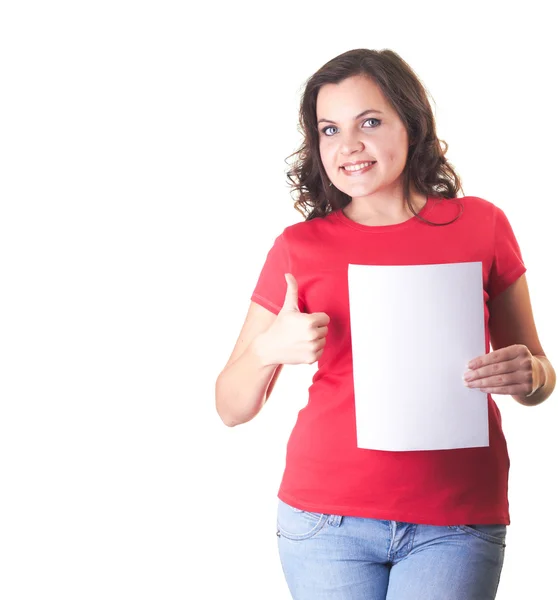 Attractive smiling girl in a red shirt and blue jeans holding a — Stock Photo, Image