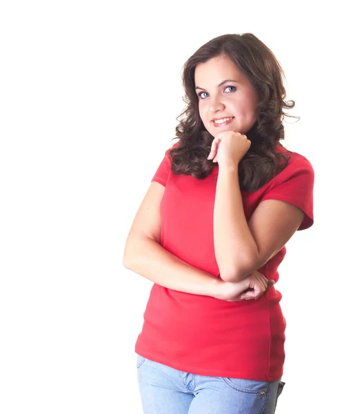 Atraktivní usmívající se dívka v červené košili a modré džíny stojící w — Stock fotografie