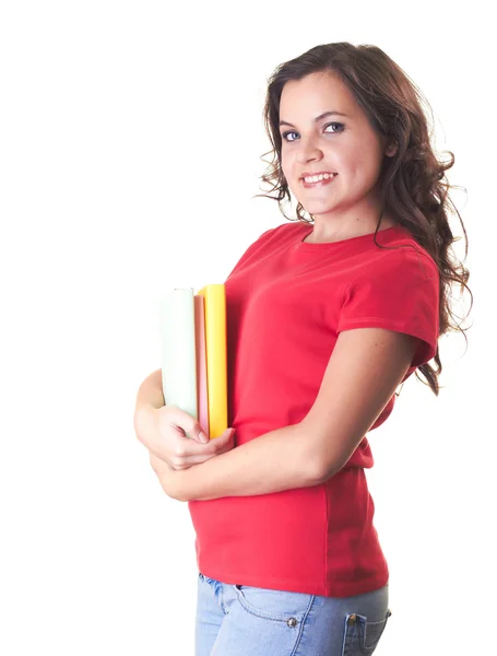 Aantrekkelijke lachende meisje in rood shirt houden een kleurrijke boek. — Stockfoto