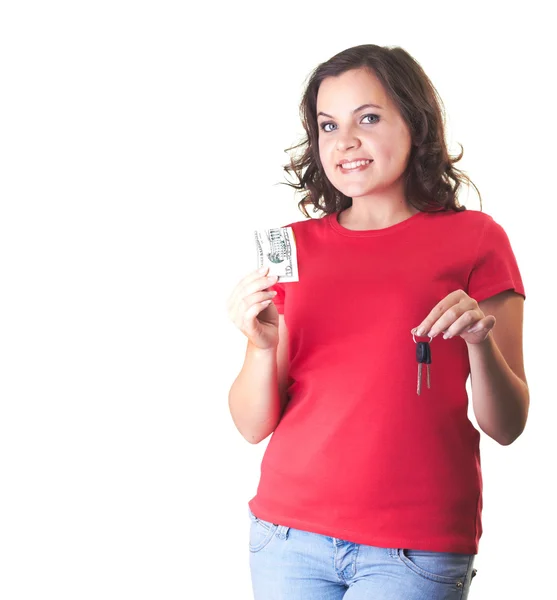Attraktivt leende flicka i en röd tröja har i sin högra hand d — Stockfoto