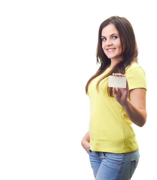 Attractive smiling young woman in a yellow shirt holding in her — Stock Photo, Image