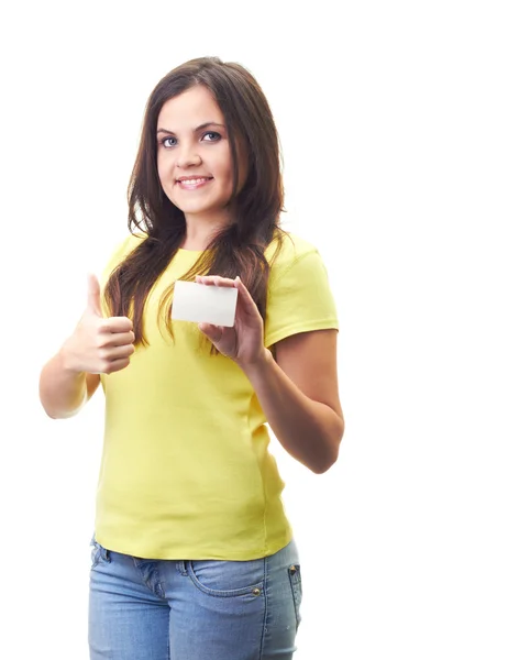 Atractiva joven sonriente con una camisa amarilla sosteniendo en su —  Fotos de Stock