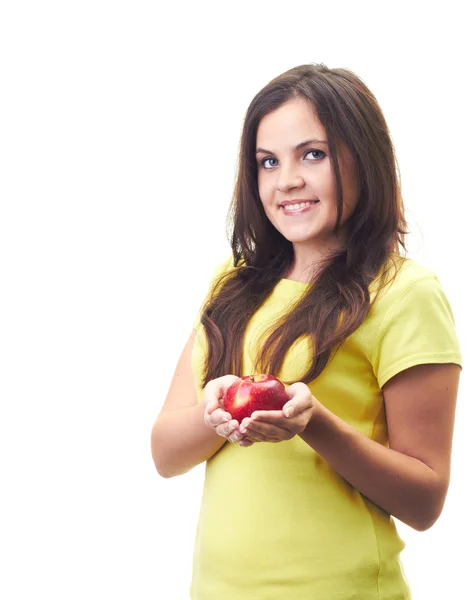 Attraente giovane donna sorridente con una camicia gialla che tiene una bellezza — Foto Stock